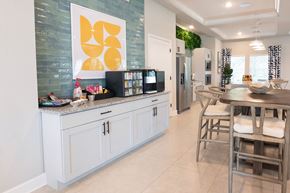 Newberry apartment for rent - A kitchen with a white counter and a fridge.