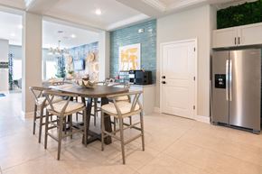 Newberry apartment for rent - A modern dining room with a wooden table and chairs.