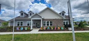 Indianapolis apartment for rent - exterior view of southern meadows apartments clubhouse