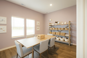 Indianapolis apartment for rent - A dining room with a table and chairs.