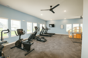 Indianapolis apartment for rent - A spacious gym with a variety of exercise equipment.
