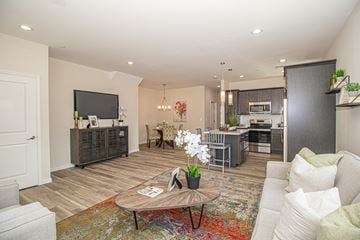 North Babylon apartment for rent - A living room with a white couch and a coffee table.