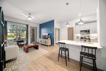 Naples apartment for rent - a living room with a kitchen and a table