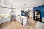Naples apartment for rent - a large kitchen with a blue and white
