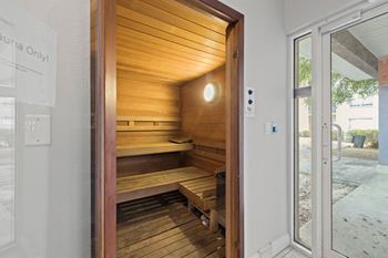 A sauna with wooden walls