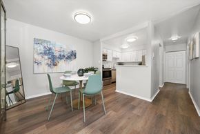 Highland apartment for rent - a dining room and kitchen with a table and chairs at Hampton in Highland Apartments, Highland