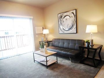 Mitchell apartment for rent - a living room with a couch and a coffee table