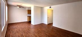 Glendale apartment for rent - a bedroom with a ceiling fan and wood laminate floors