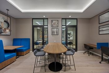 Conference room with round wooden table