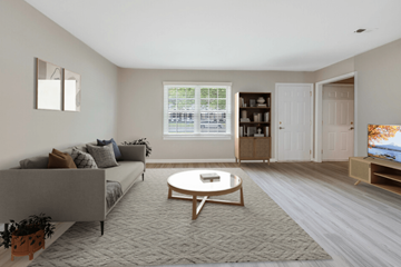 Wilson apartment for rent - a living room with a couch and a coffee table