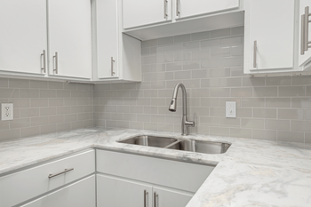 Kitchen with white cabinets