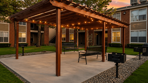 El Paso apartment for rent - Outdoor pergola with string lights and seating at Las Lomas Apartments, El Paso, 79912