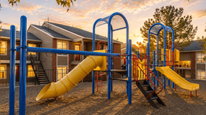 El Paso apartment for rent - Childrens playground with slides and climbing structure at Las Lomas Apartments, El Paso, Texas