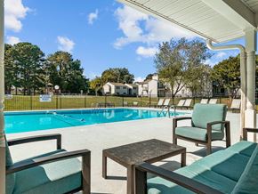 Raleigh apartment for rent - poolside chairs at Rosen at North Hills, Raleigh, North Carolina