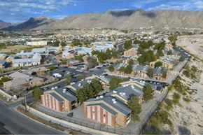 El Paso apartment for rent - Aerial view of apartment community with mountain backdrop at Las Lomas Apartments, El Paso