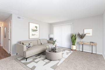 Fayetteville apartment for rent - a living room with a couch and a coffee table