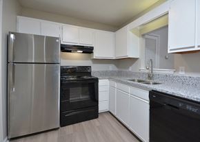 Greenville apartment for rent - kitchen with stainless steel refrigerator at Bennett, Greenville