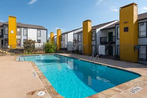 Dallas apartment for rent - our apartments have a large swimming pool in front of our buildings at Helios, Dallas, 75240