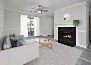 Fayetteville apartment for rent - a living room with a fireplace and a couch at Henley, Fayetteville