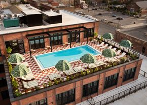 New Orleans apartment for rent - a rendering of a pool on the roof of a building