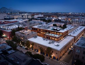 New Orleans apartment for rent - an aerial view of a building in a city at night