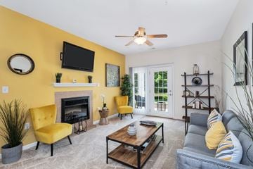 Chester apartment for rent - A living room with a yellow chair and a fireplace.