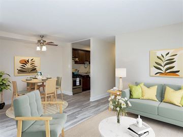 Beltsville apartment for rent - a living room with a couch and a table