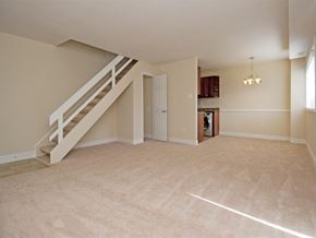 Greenbelt apartment for rent - Livingroom, dining room, kitchen & stairs to 2nd floor