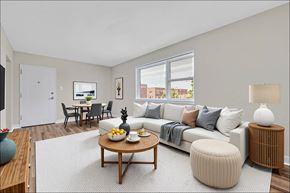 Hyattsville apartment for rent - Virtually staged living and dining room.