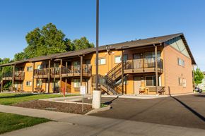 Walla Walla apartment for rent - the exterior of an apartment building with balconies and stairs