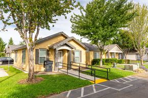 College Place triplex for rent - the preserve at ballantyne commons apartments exterior with stairs and trees