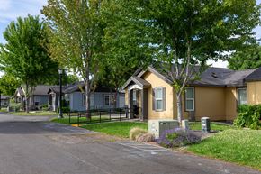 College Place triplex for rent - a row of houses on the side of a street