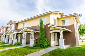 Walla Walla triplex for rent - a house with a sidewalk in front of it