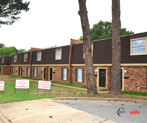 Memphis apartment for rent - a row of houses with foreclosure signs in front of them