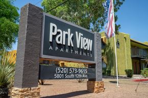 Tucson apartment for rent - A sign for Park View Apartments is displayed in front of a building.