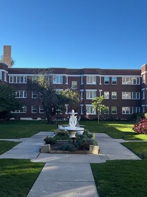 Salt Lake City apartment for rent - A large building with a fountain in front of it.