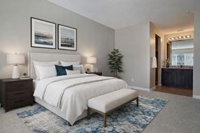 St. George apartment for rent - A bedroom with a large bed and two lamps.