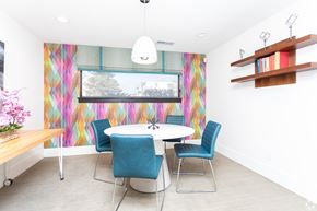 Clearfield apartment for rent - A dining room with a white table and blue chairs.
