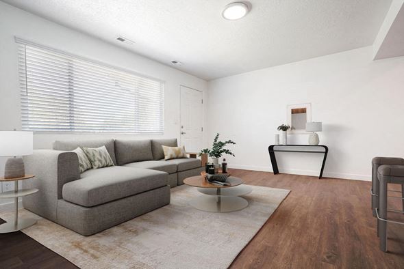 Roy apartment for rent - a living room with a couch and a coffee table