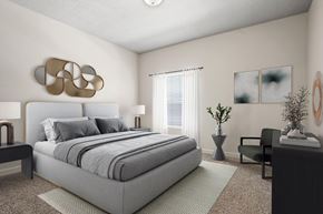 Salt Lake City apartment for rent - A modern bedroom with a large bed and a grey carpet.