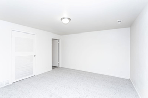 Salt Lake City townhouse for rent - A white room with a door and a light on the ceiling.