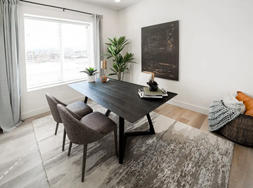Springville apartment for rent - A modern dining room with a large table and chairs.