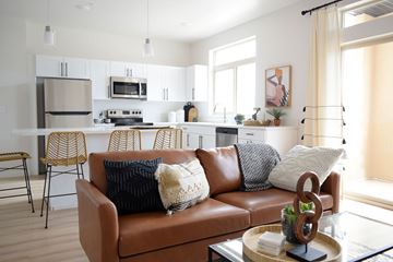 St George apartment for rent - a living room with a couch and a kitchen
