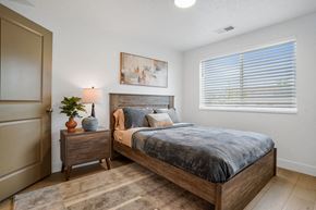 Ogden apartment for rent - a bedroom with a bed and a window