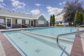 Providence apartment for rent - A swimming pool with a metal ladder in the middle.