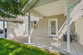 Layton townhouse for rent - the front entrance of a house with a white door and a porch