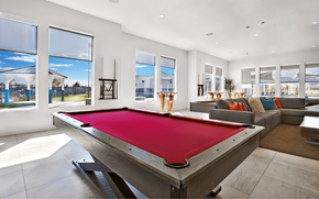 West Jordan apartment for rent - A pool table in a room with a view of the outside.