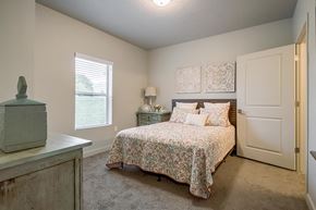 Clearfield apartment for rent - a bedroom with a bed and a dresser