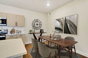 West Haven apartment for rent - A dining room with a table and chairs.