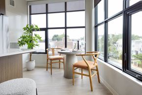 Boston apartment for rent - a dining room with a table and chairs in front of a window